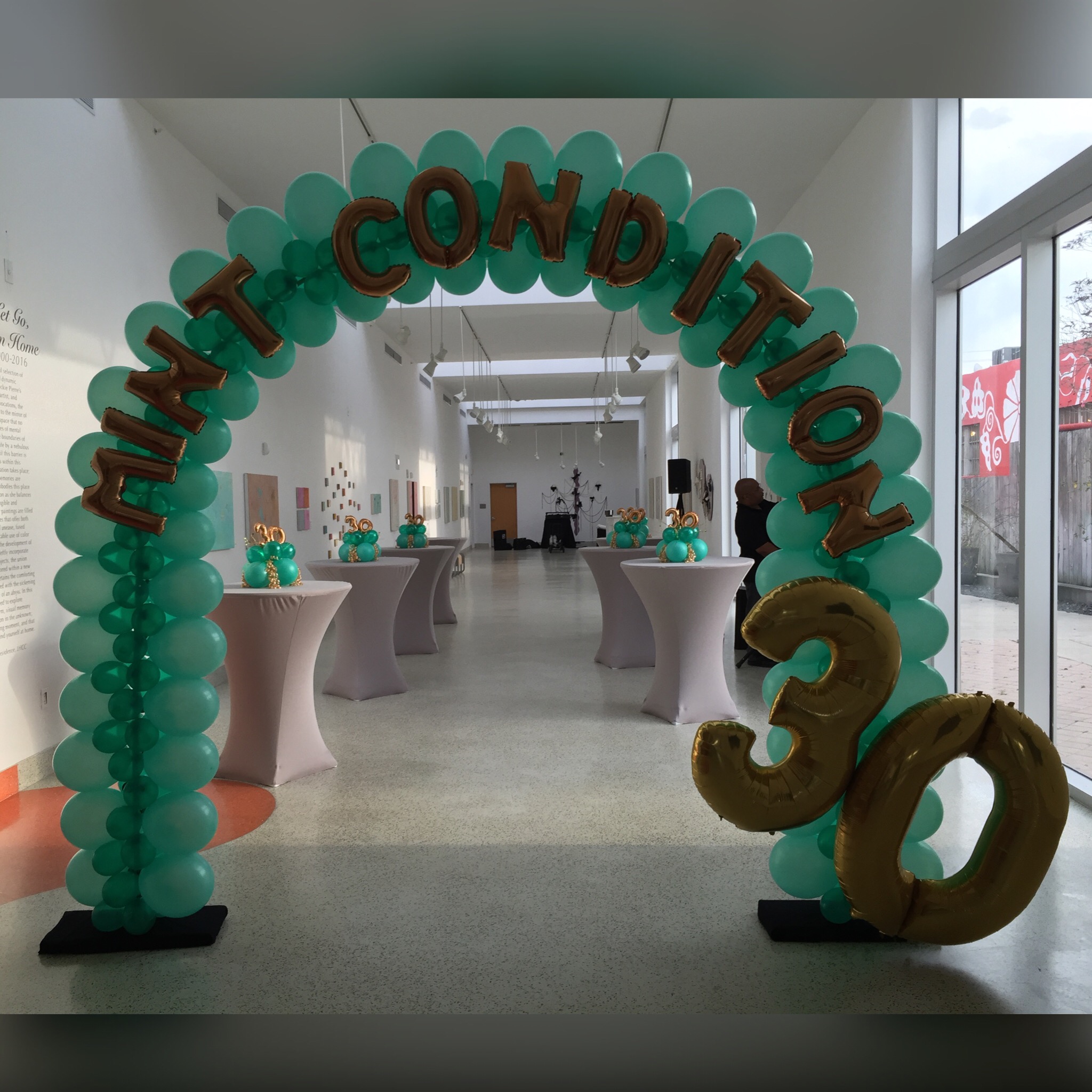 Personalized balloon arch with name theme and age